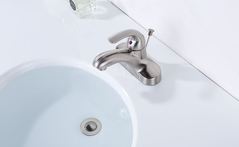 basin waste with lift rod installed with faucet